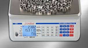 Digital piece counting scale with parts on platform